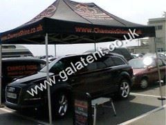 Gazebo being used for shelter for car while being valeted