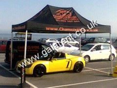 Gazebo being used for shelter for car while being valeted