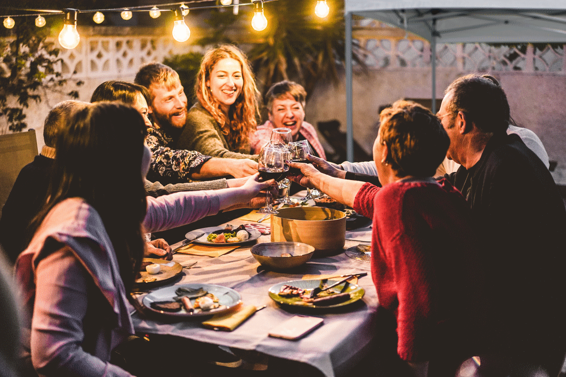 Family barbecue next to a gazebo