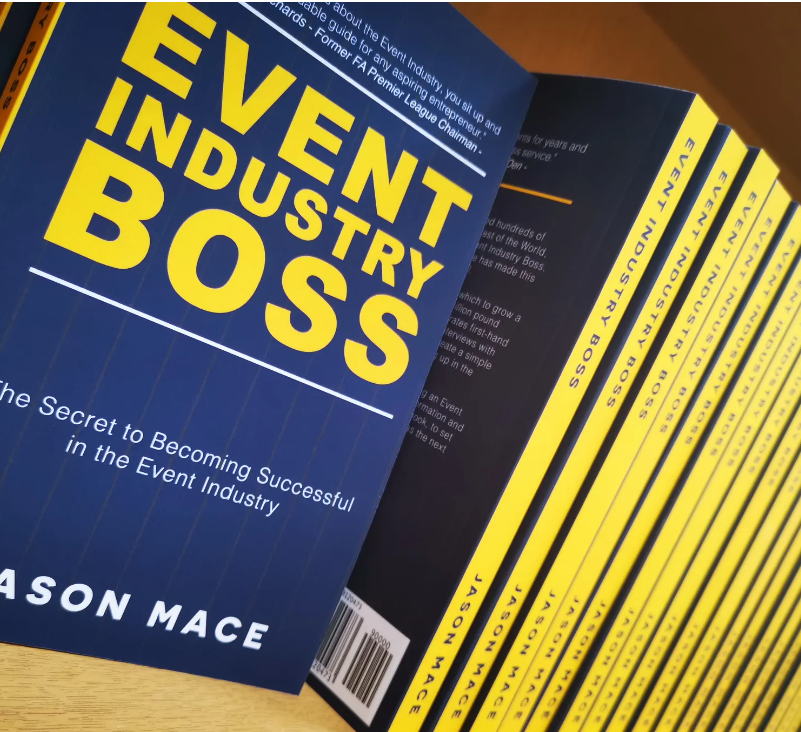 Several copies of the book Event Industry Boss, by Jason Mace