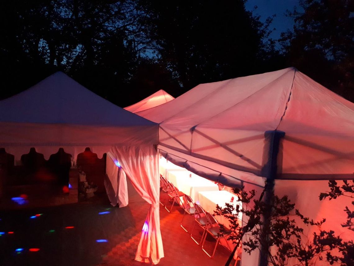 pop up garden gazebos with decorative leg valances in the garden