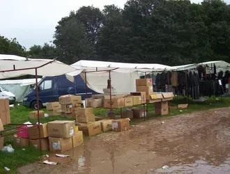 A broken market stall on a rainy day