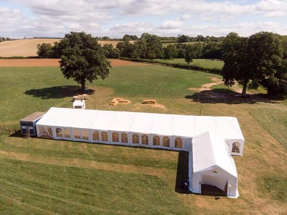 big hire marquee wedding A long shot photograph of a large wedding marquee
