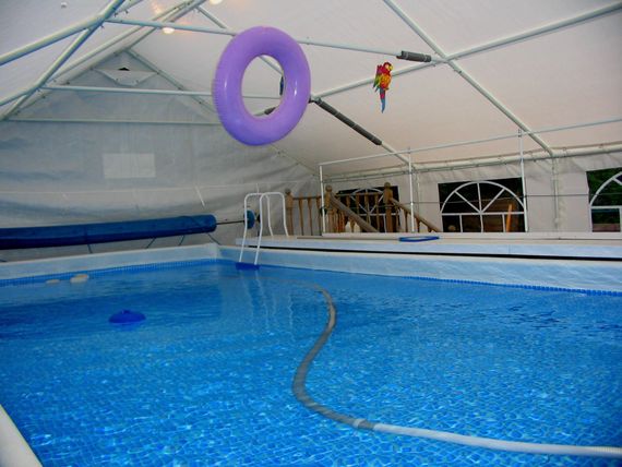 marquee swimming pool cover An interior shot of a marquee swimming pool cover