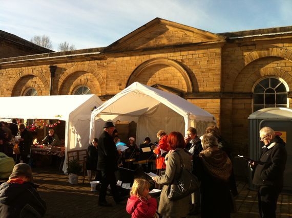 A small marquee at an outdoor market