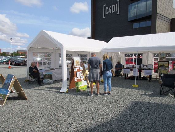 artists stall in a marquee