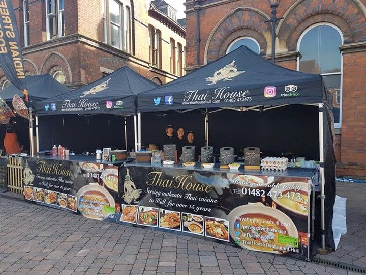 A gazebo with custom printed branding for a streetfood vendor