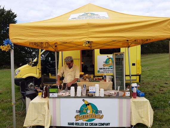 yellow printed ice cream gazebo Yellow printed gazebos at an outdoor event