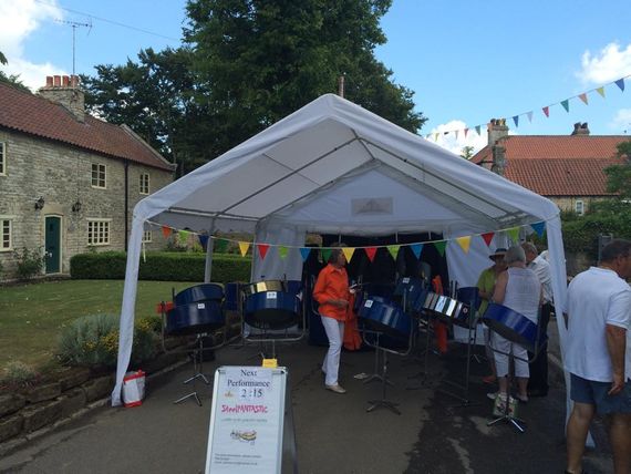 A marquee providing shelter at a summer festival