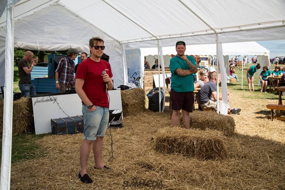A marquee providing shelter at a summer festival