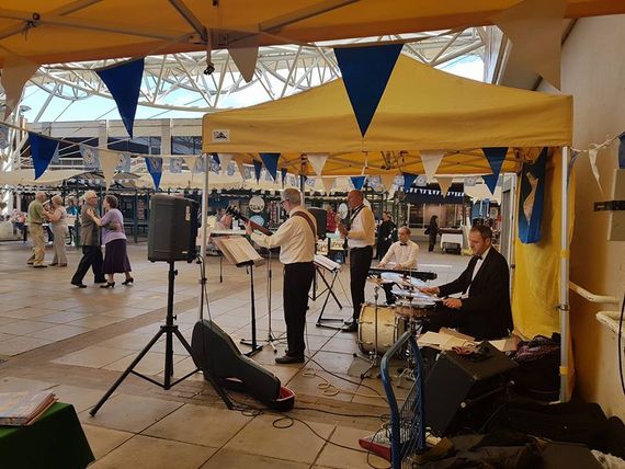 Yellow gazebo covering a jazz band