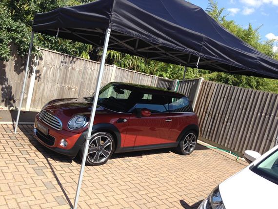 Gala Shade Pop Up Gazebo sheltering a car on a driveway