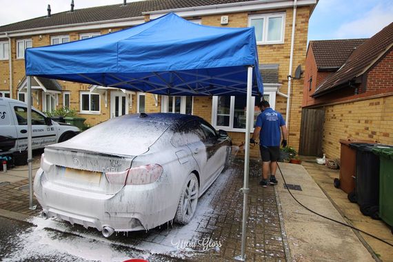 Gala Shade Pop Up Gazebo sheltering a car on a driveway