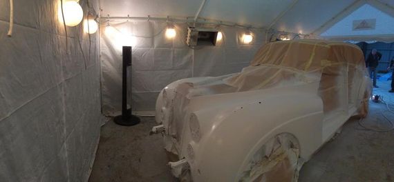 An interior view of a marquee being utilised as a spray booth