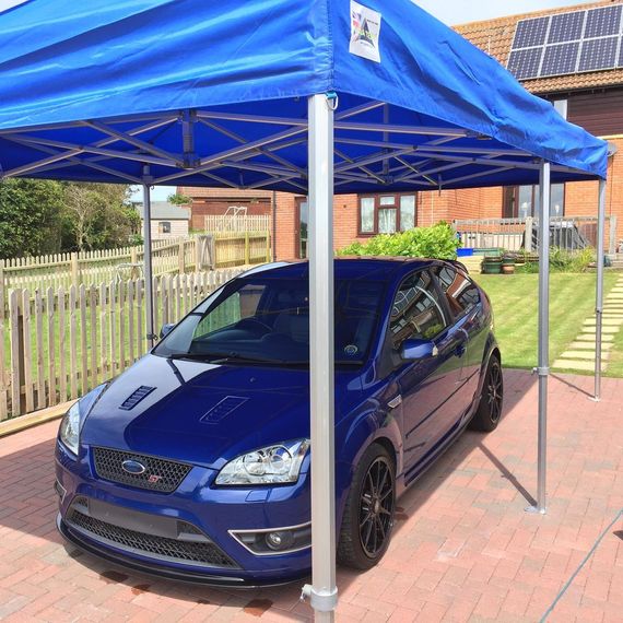 Gala Shade Pop Up Gazebo sheltering a car