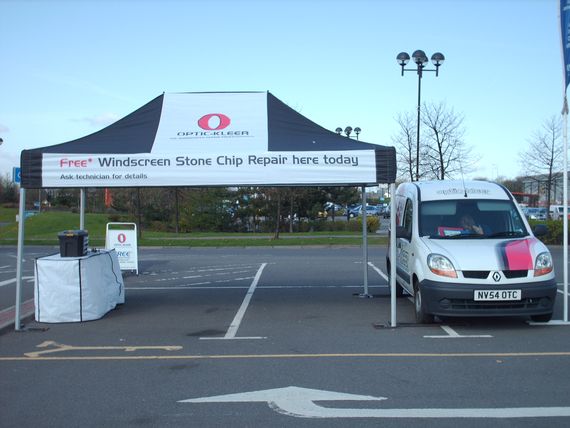 A printed black and white gazebo canopy and valance for a windscreen repair company