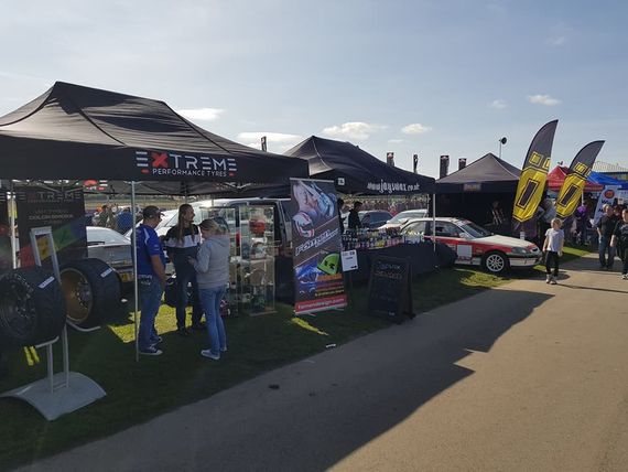 printed motor show gazebos black Printed Pop Up Motorsport Tent at an outdoor motorsports event