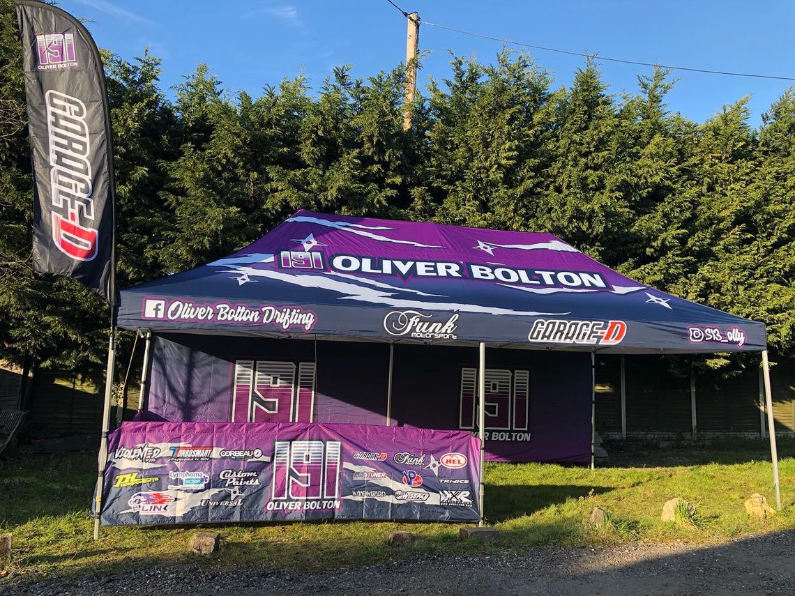 Printed Pop Up Motorsport Tent at an outdoor motorsports event