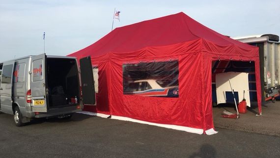big red motorsport tent