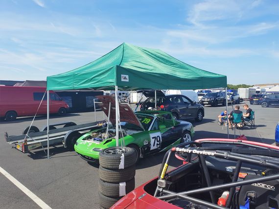green race tent Gala Tent Gazebo at a motorsport event