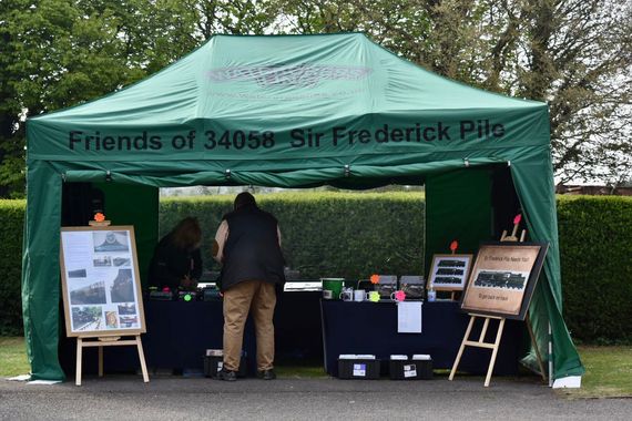 green printed info gazebo A printed gazebo with a company logo at an outdoor event