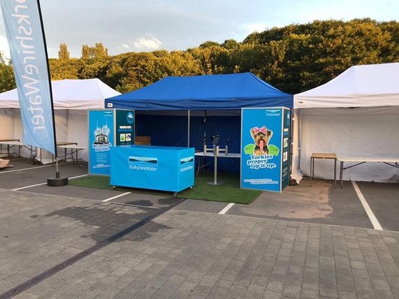 information gazebo printed A printed gazebo with a company logo at an outdoor event