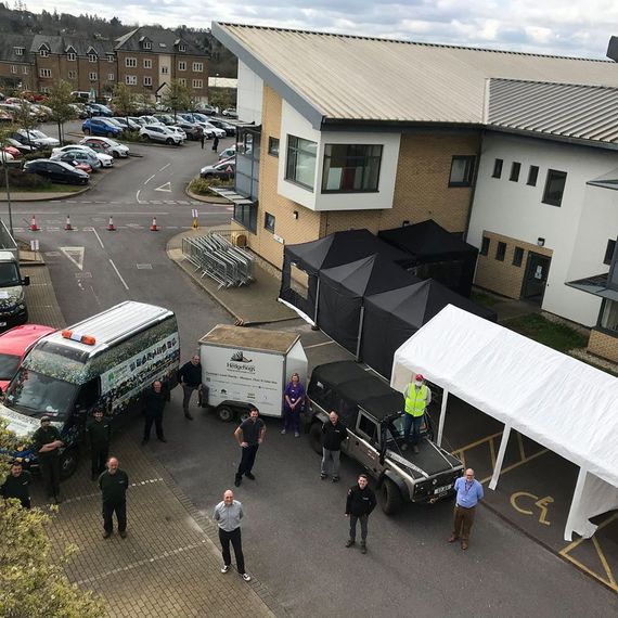 medical centre gazebo marquee shelter 2 Gazebos for NHS Nightingale set up outdoors in the car park