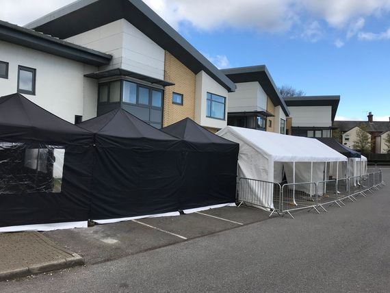 medical centre gazebo marquee shelter Gazebos for NHS Nightingale set up outdoors in the car park