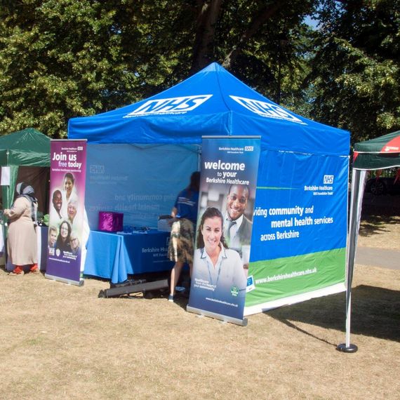 printed nhs gazebo information tent A printed NHS Information gazebo with printed info banners in front of it