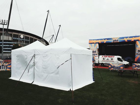 white information gazebos White gazebos outside a sports stadium