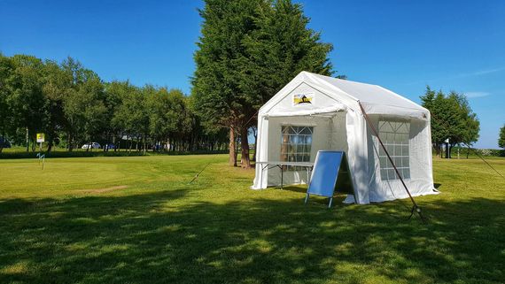 A small Gala Tent PE Marquee on a golf course