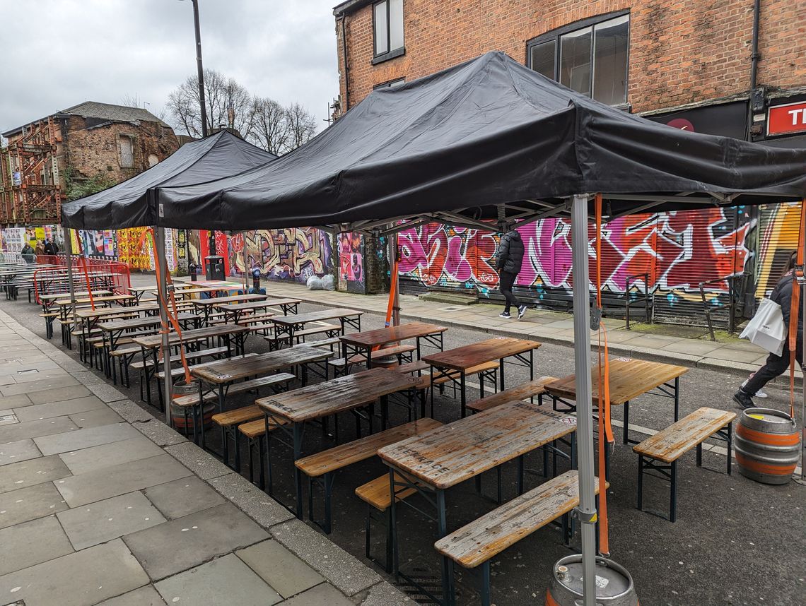 Manchester Market black pop up gazebos outdoors