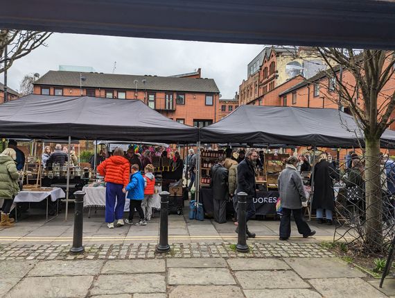 Manchester Market black pop up gazebos outdoors