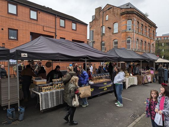 Manchester Market black pop up gazebos outdoors