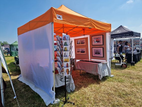 Orange gazebo at an outdoor event