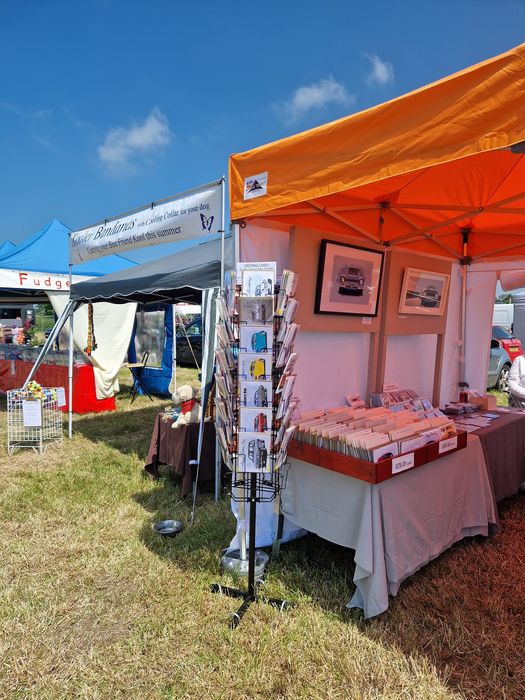Orange gazebo at an outdoor event