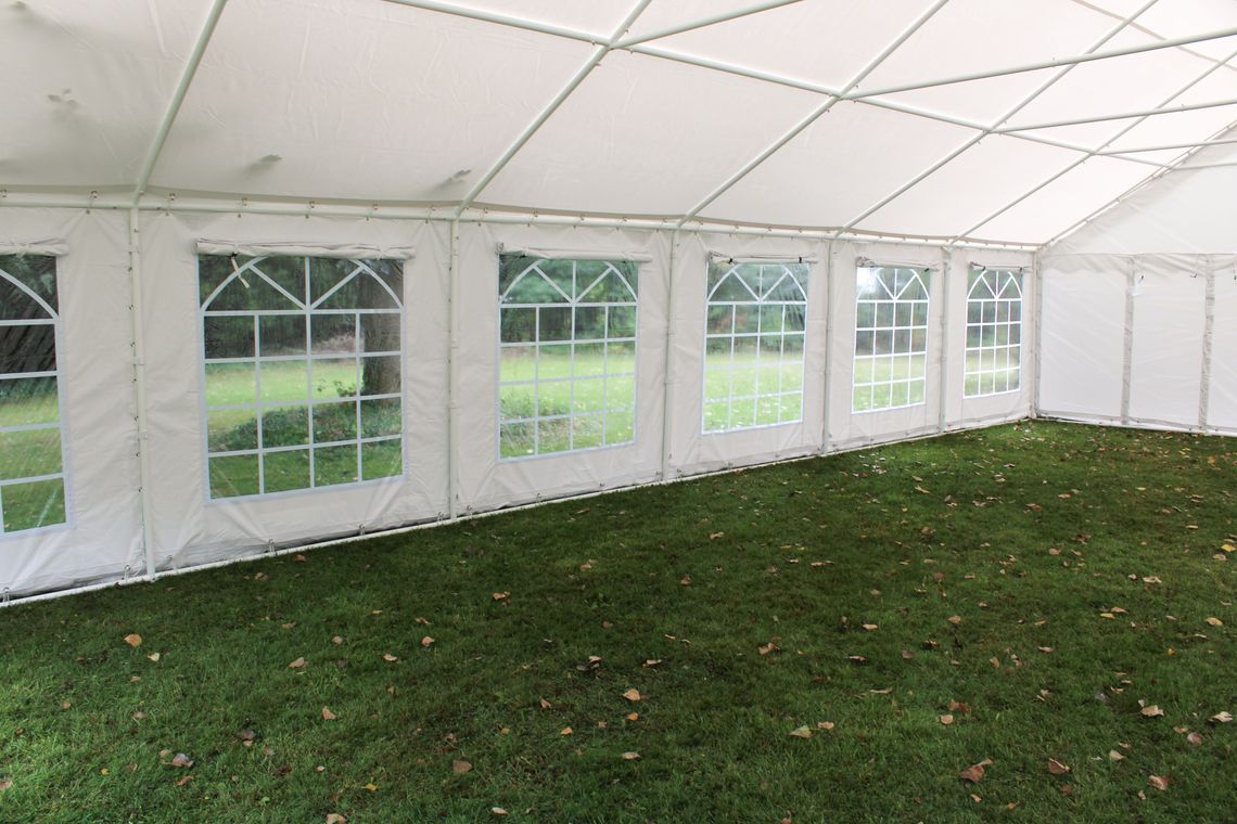 an interior view of a 6m x 12m PVC marquee with sidewall windows