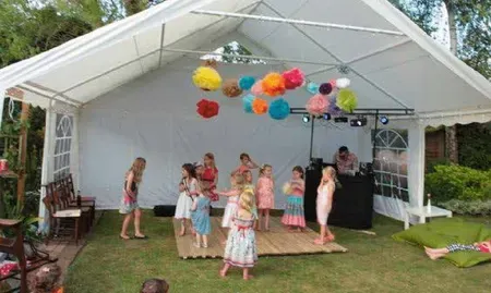 Children in a party tent