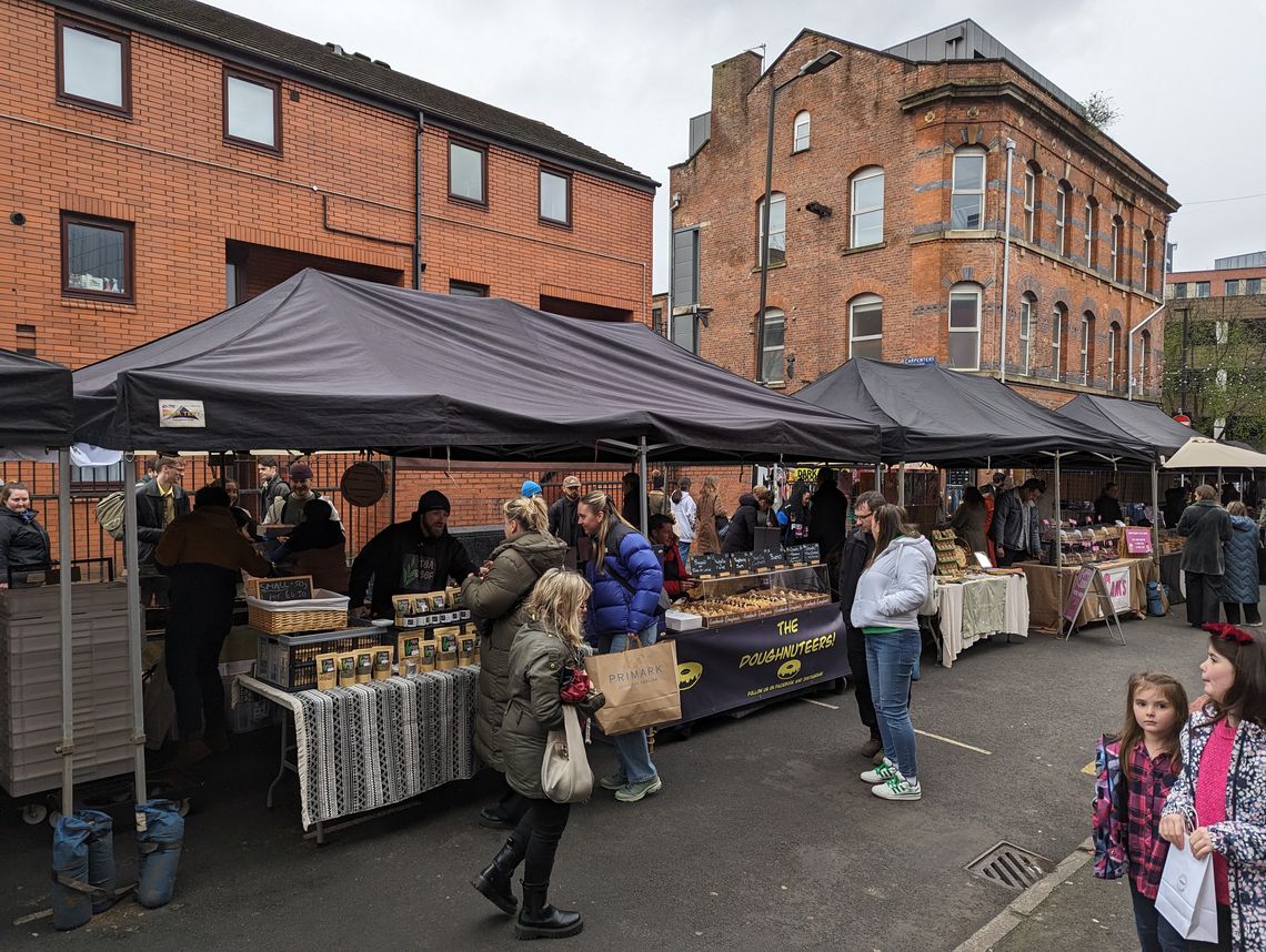 Black pop up marquees in Manchester markets