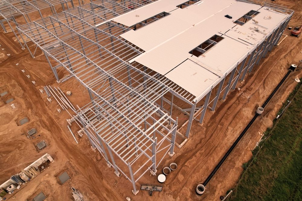 Overhead shot of a warehouse building framework being erected